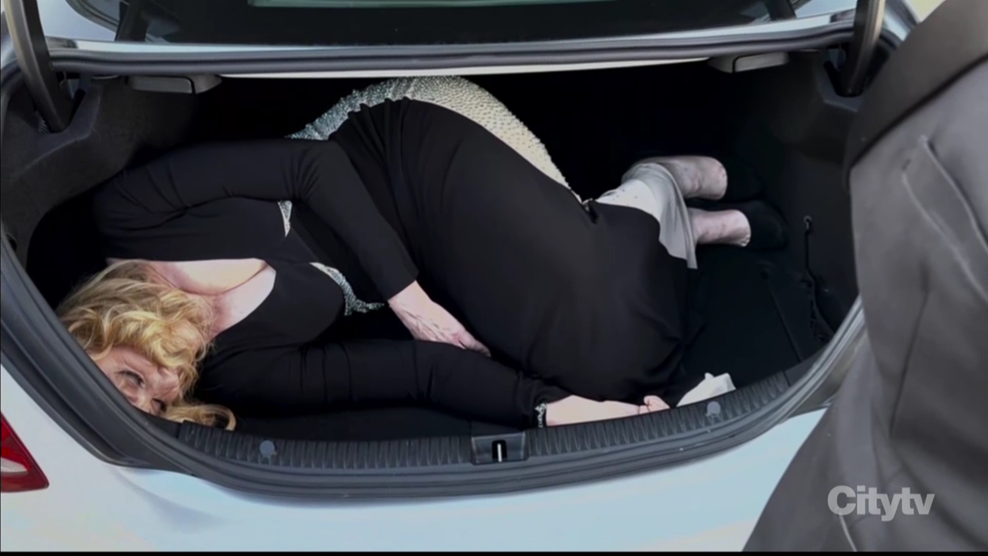 liesl in car trunk