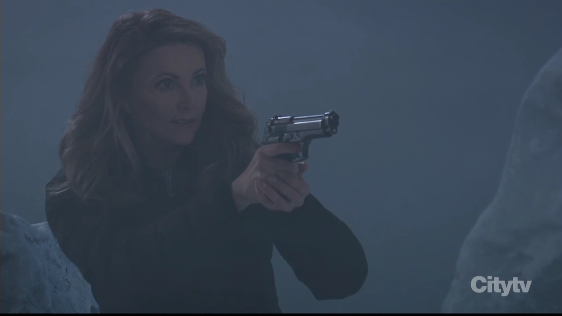 holly with a gun on victor.