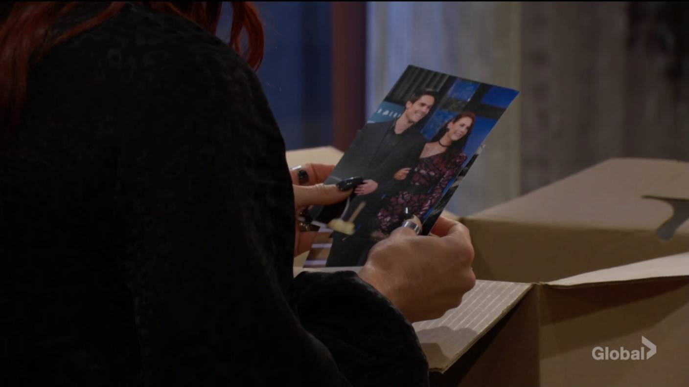 sally finds photos of her and adam.