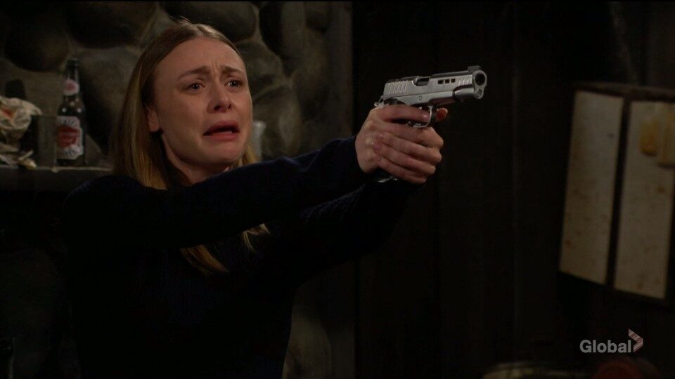 Claire holds gun at Jordan.