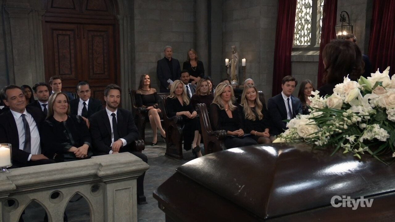 funeral guests in chapel
