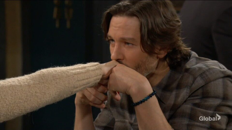 daniel kisses heather hand